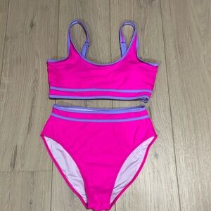 2- piece swimsuit, adjustable straps, lined. Size L. High waist bottoms